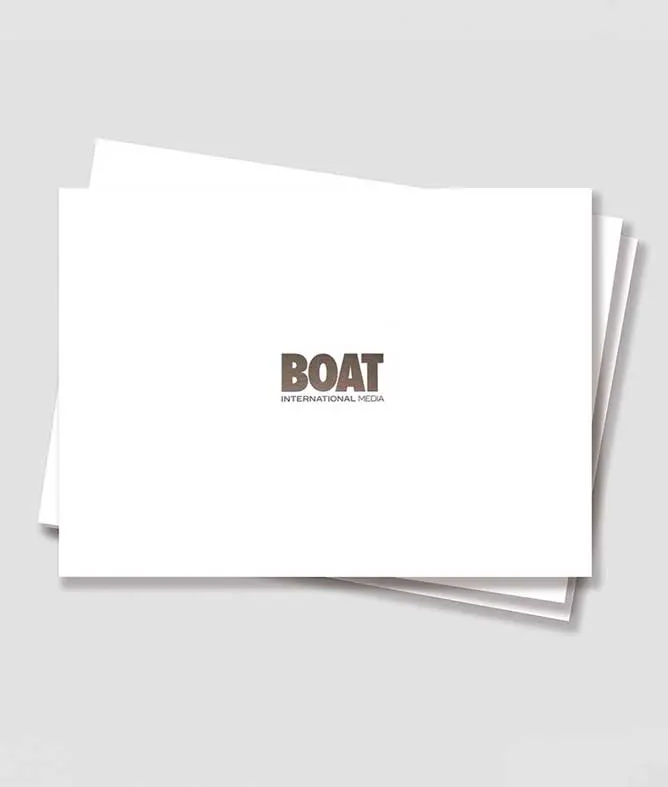 Boat International Media Pack front cover featuring silver foil logo, graphic design by SONIA CAMERON
