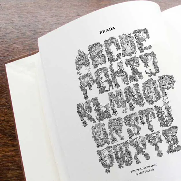 Inside page of the Illuminated Letters leather bound book showing the Pradalphabet
