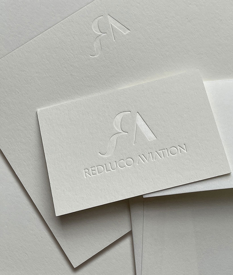 Redluco Aviation business card and stationery