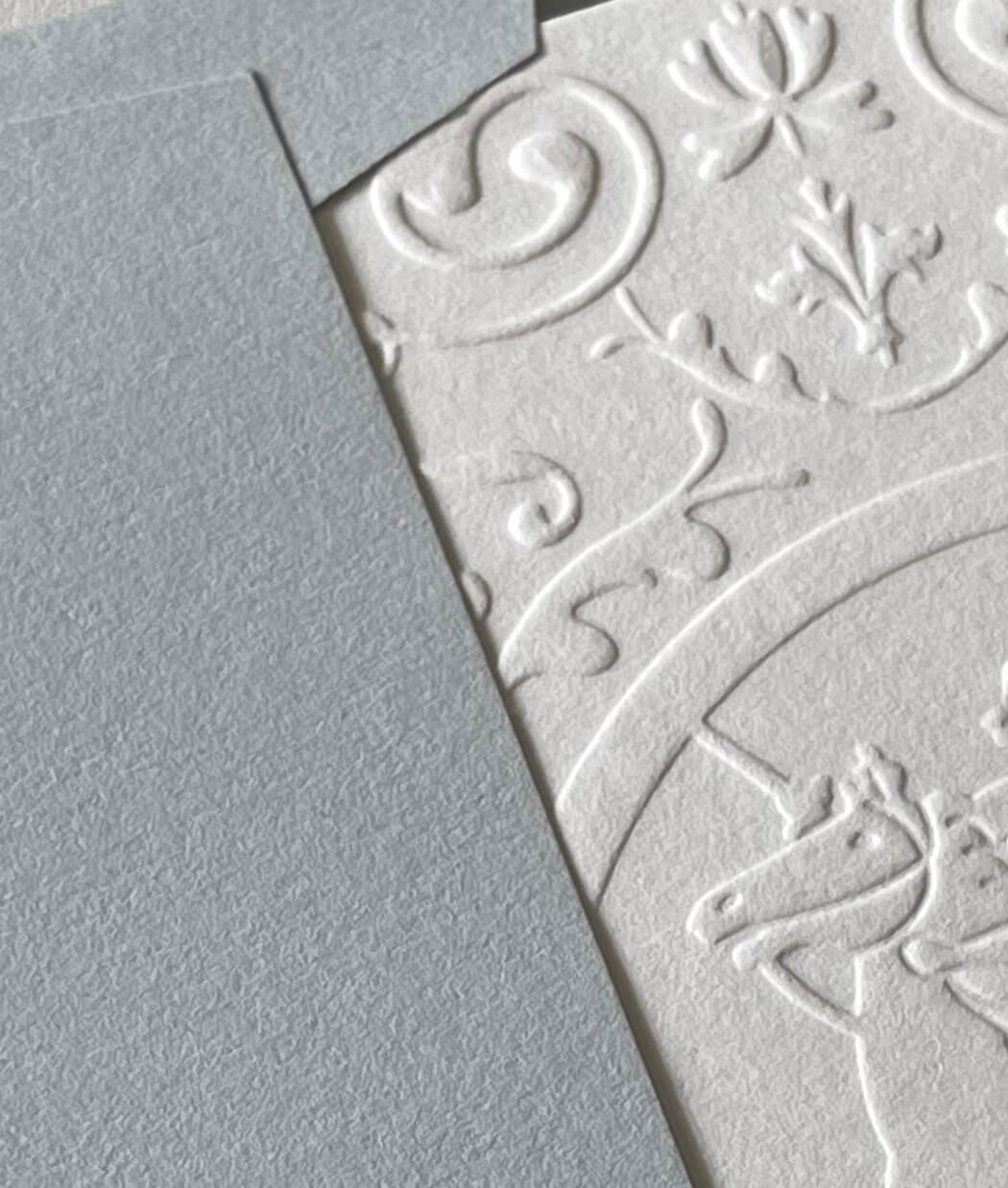 Blind embossed greeting card with blue envelope