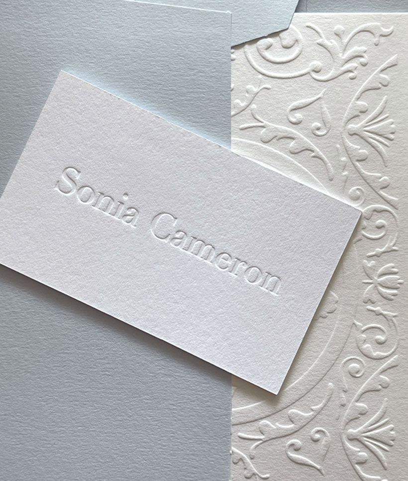 Sonia Cameron blind debossed cranes crest business card and blind embossed colorplan greeting card with colorplan blue envelope